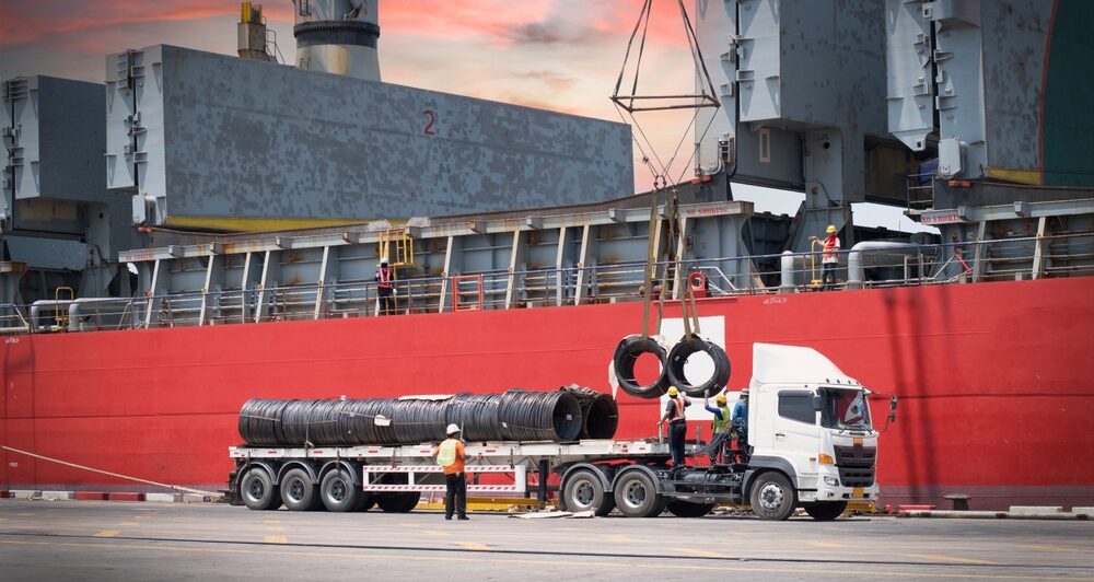 Cargo,Ship,Discharging,Steel,Wire,Rod,At,Port,Terminal.,Truck Překládka zboží