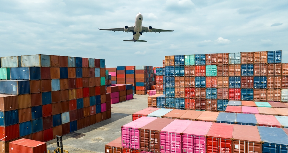 Airplane,Flying,Above,Container,Logistic.,Container,Crisis.,Freight,Transportation.,Logistic Letecká doprava